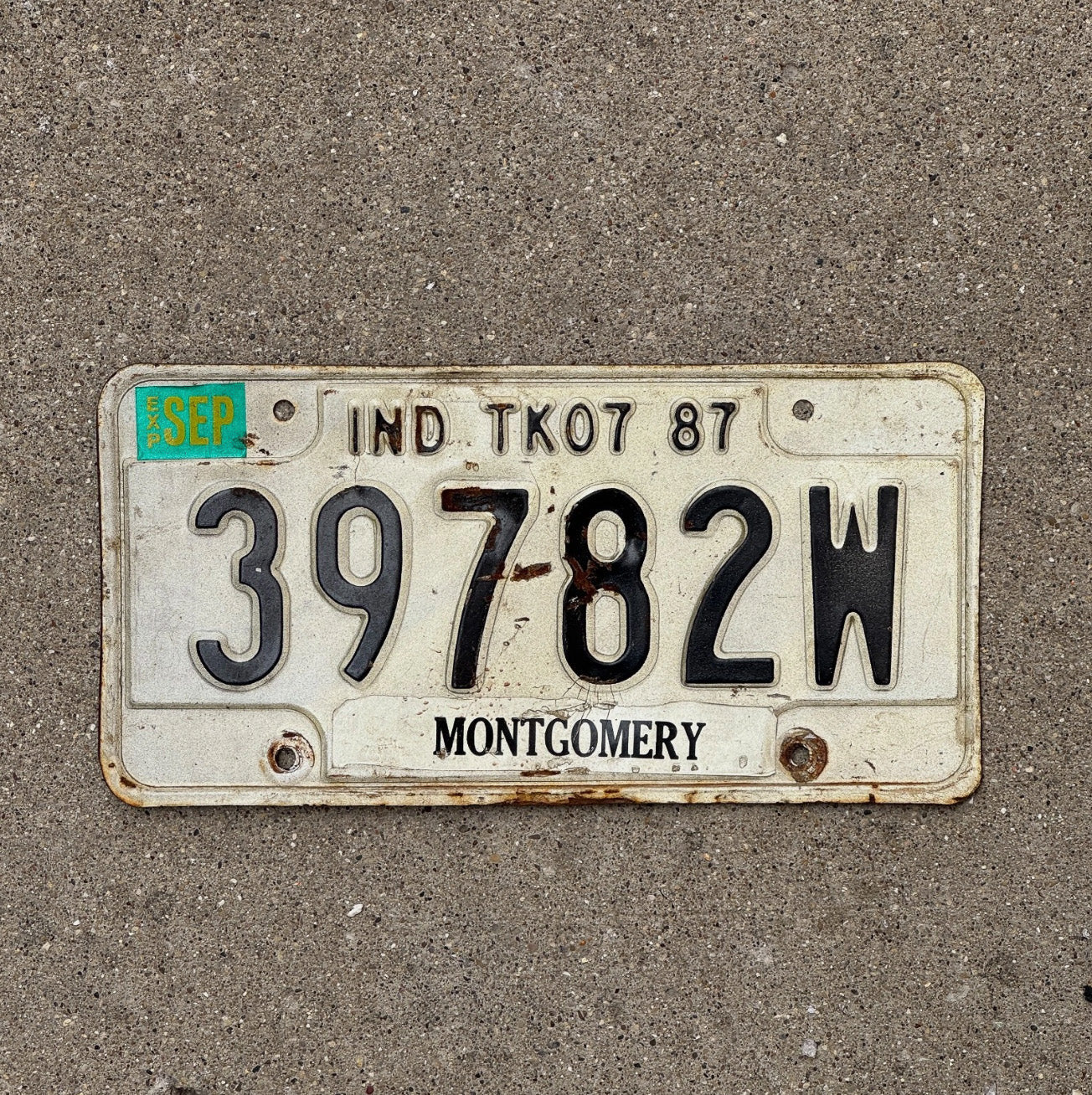 Photo of a 1987 Indiana Truck License Plate Auto Tag Garage Decor 39782 W