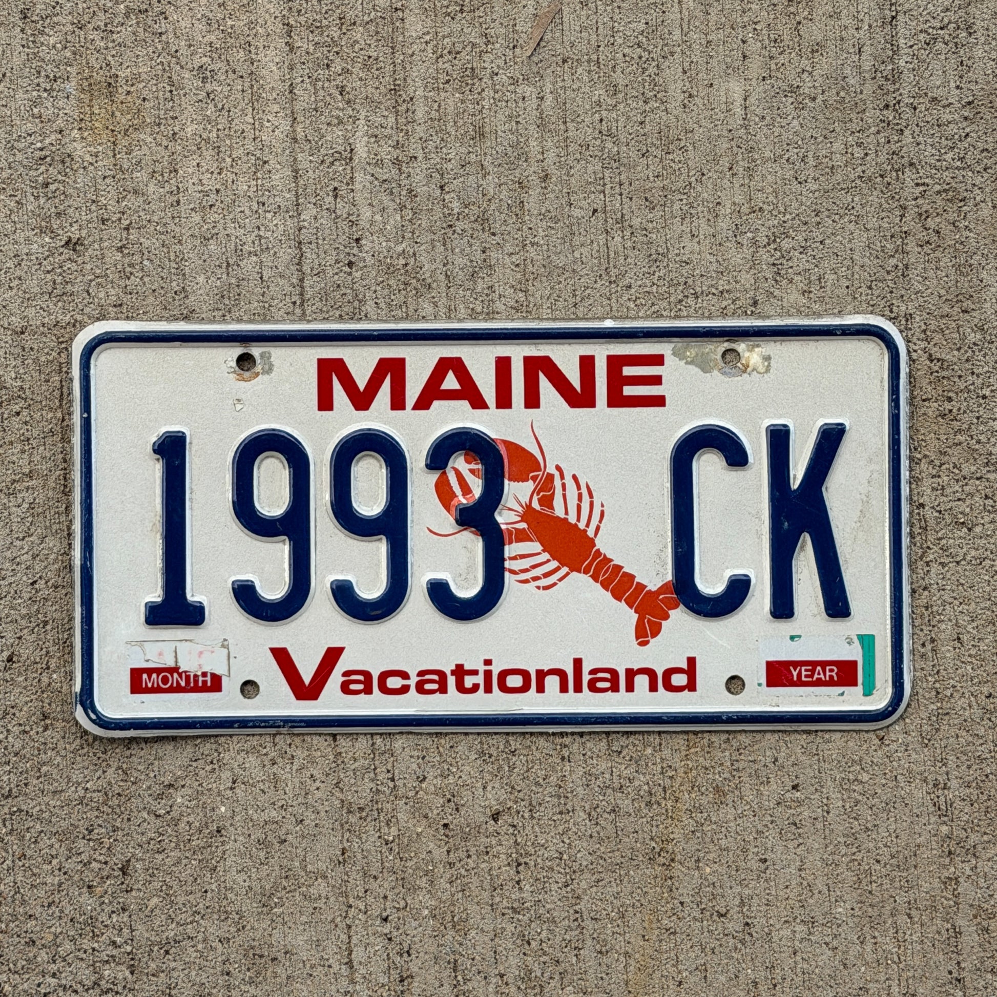 Photo of a 1987 Maine License Plate Auto Tag Garage Decor Vintage Lobster 1993 CK with original patina