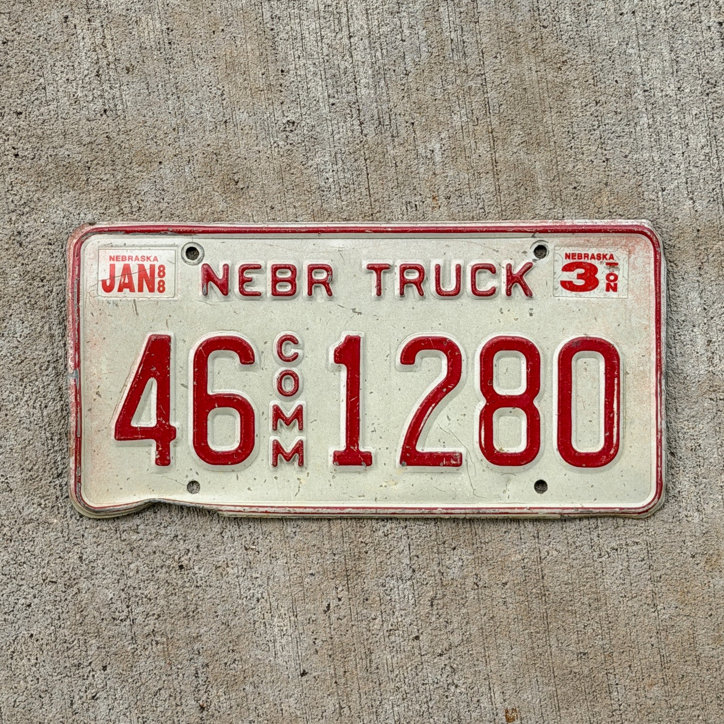 Photo of a 1987 Nebraska Commercial License Plate Auto Tag Garage Decor Vintage 46 1280 with original patina