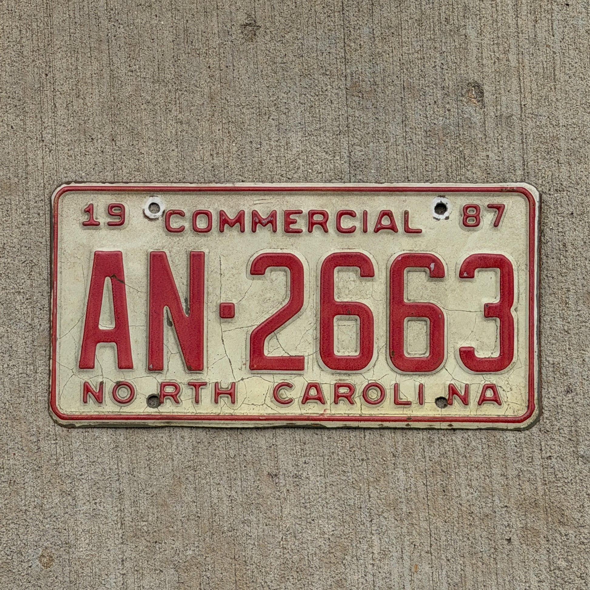 Photo of a 1987 North Carolina Commercial License Plate Auto Tag Garage Decor Vintage AN 2663 with original patina