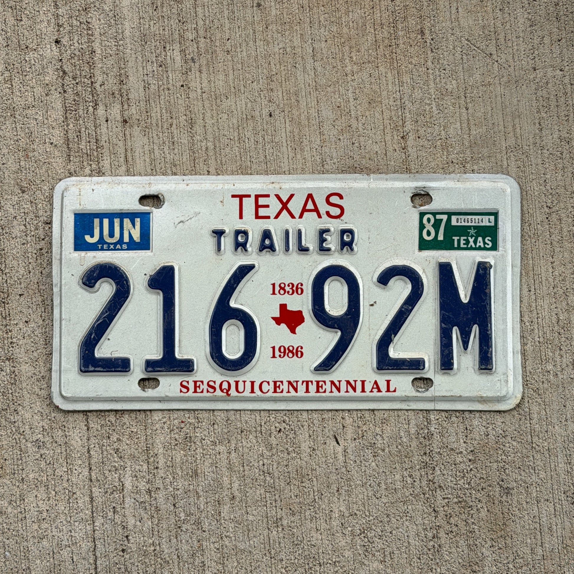 Photo of a 1987 Texas Trailer License Plate Auto Tag Garage Decor Vintage 216 92 M with original patina
