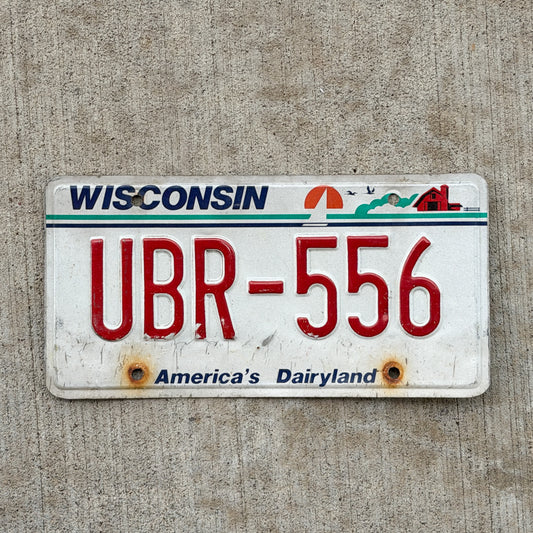 Photo of a 1987 Wisconsin License Plate Auto Tag Garage Decor Vintage UBR 556 with original patina