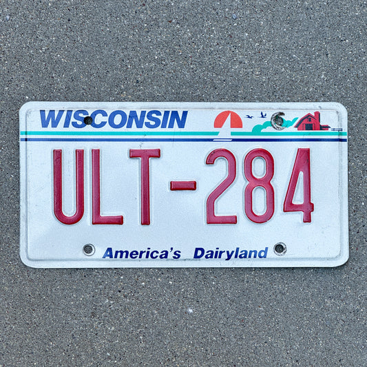 Photo of a 1987 Wisconsin License Plate Auto Tag Garage Decor Vintage ULT 284 with original patina
