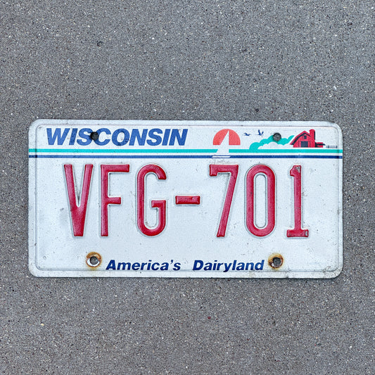 Photo of a 1987 Wisconsin License Plate Auto Tag Garage Decor Vintage VFG 701 with original patina