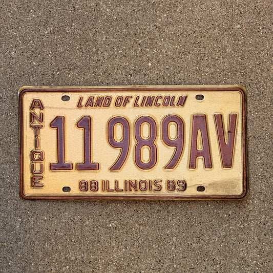 Photo of a 1988 1989 Illinois Antique Vehicle License Plate Auto Tag Garage Decor Vintage 11989 AV with original patina