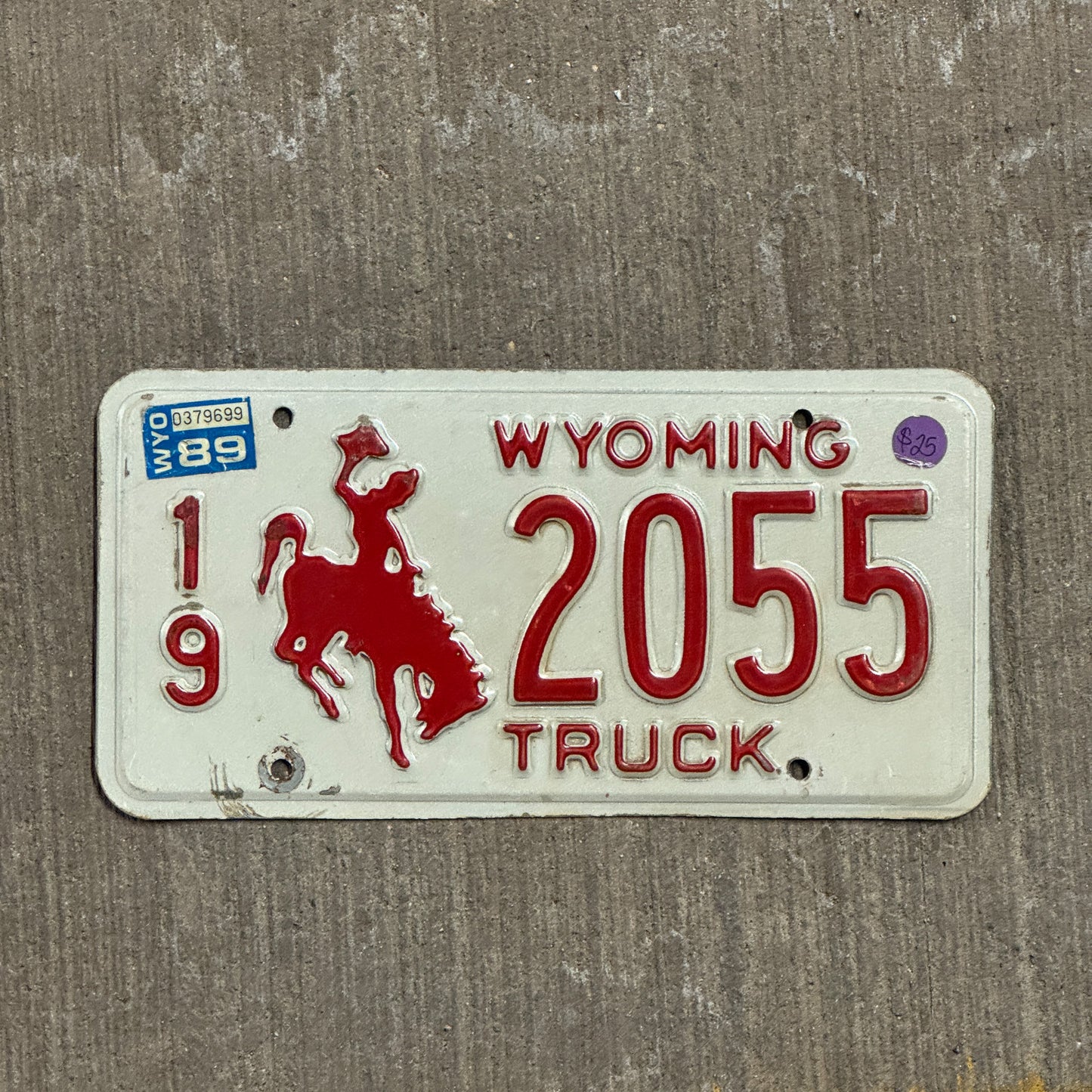Photo of a 1988 1989 Wyoming Truck License Plate Auto Tag Garage Decor Vintage 19 2055 with original patina