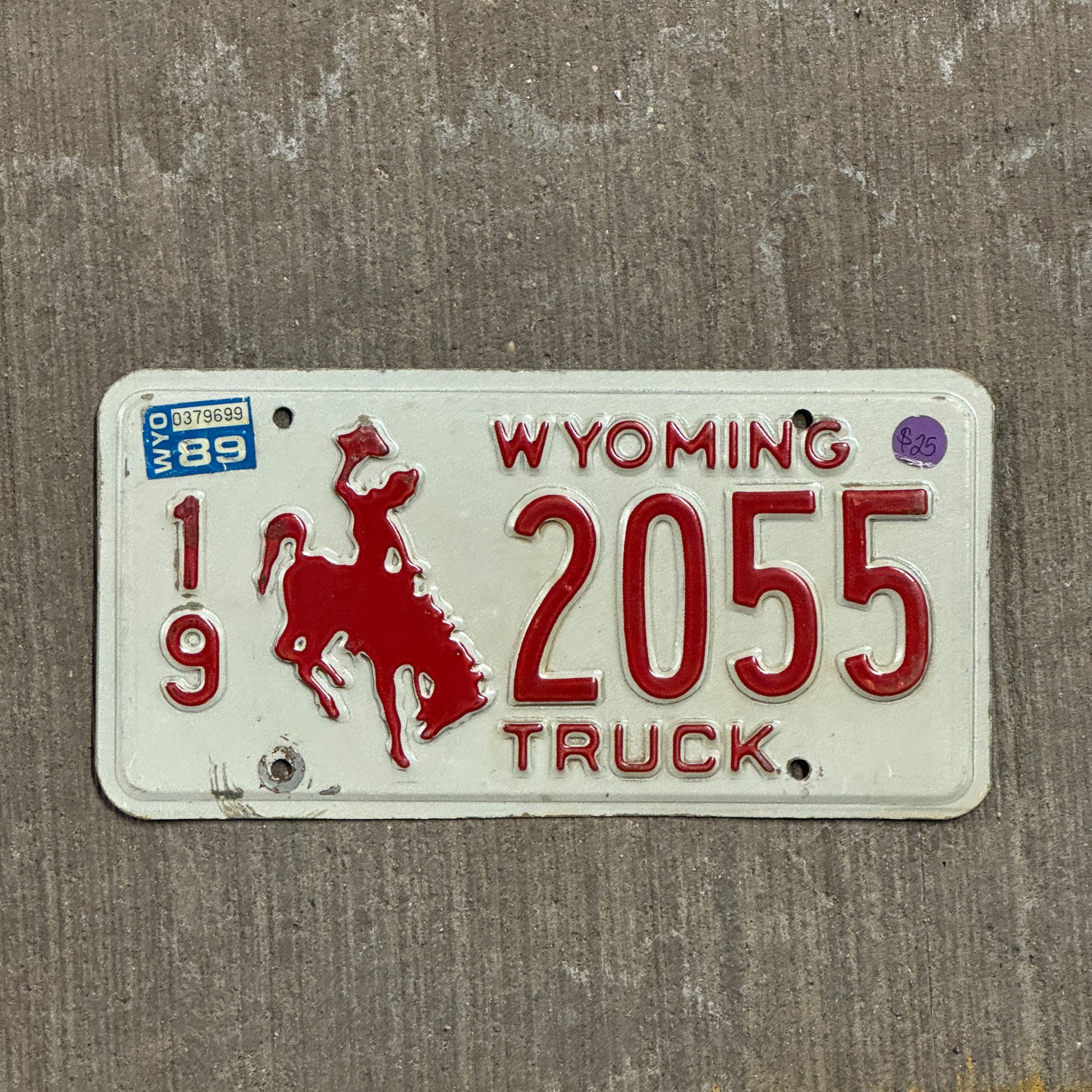 Photo of a 1988 1989 Wyoming Truck License Plate Auto Tag Garage Decor Vintage 19 2055 with original patina