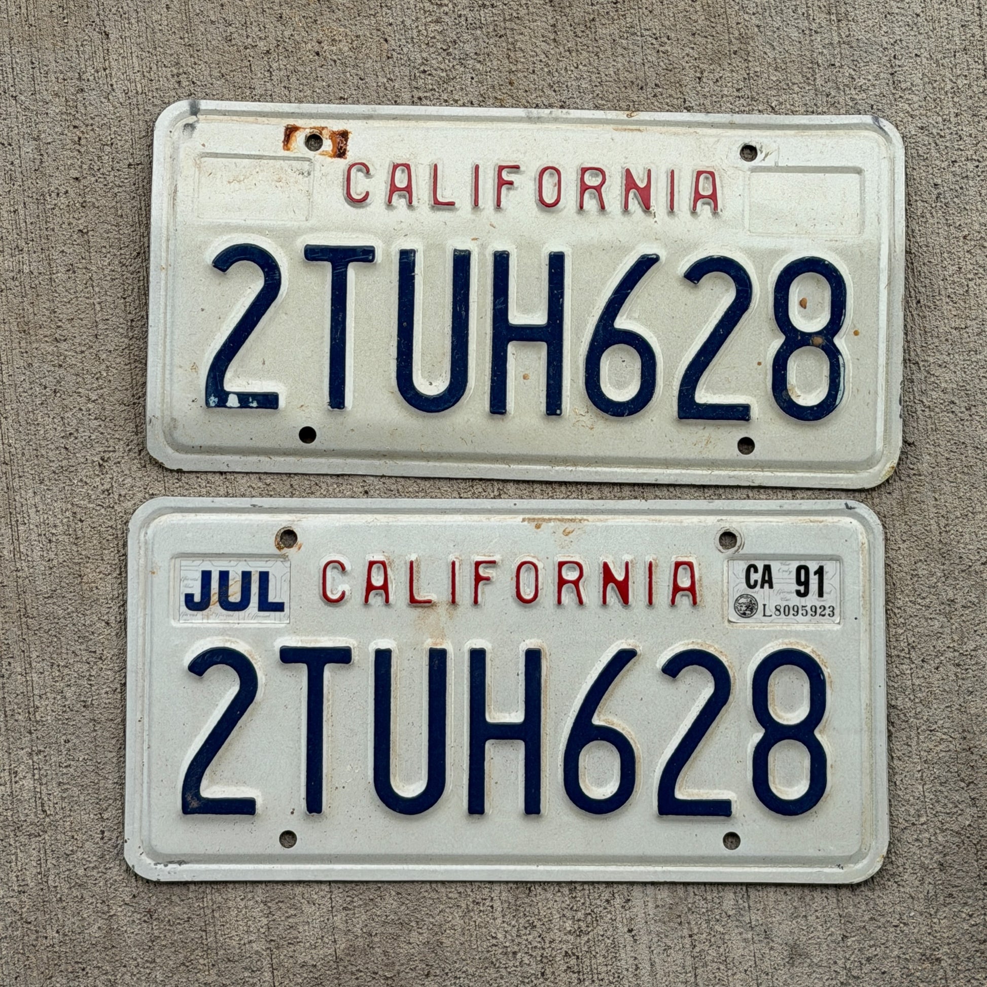 Photo of a 1988 1991 California License Plate Pair Auto Tag Garage Decor Vintage 2 TUH 628 with original patina