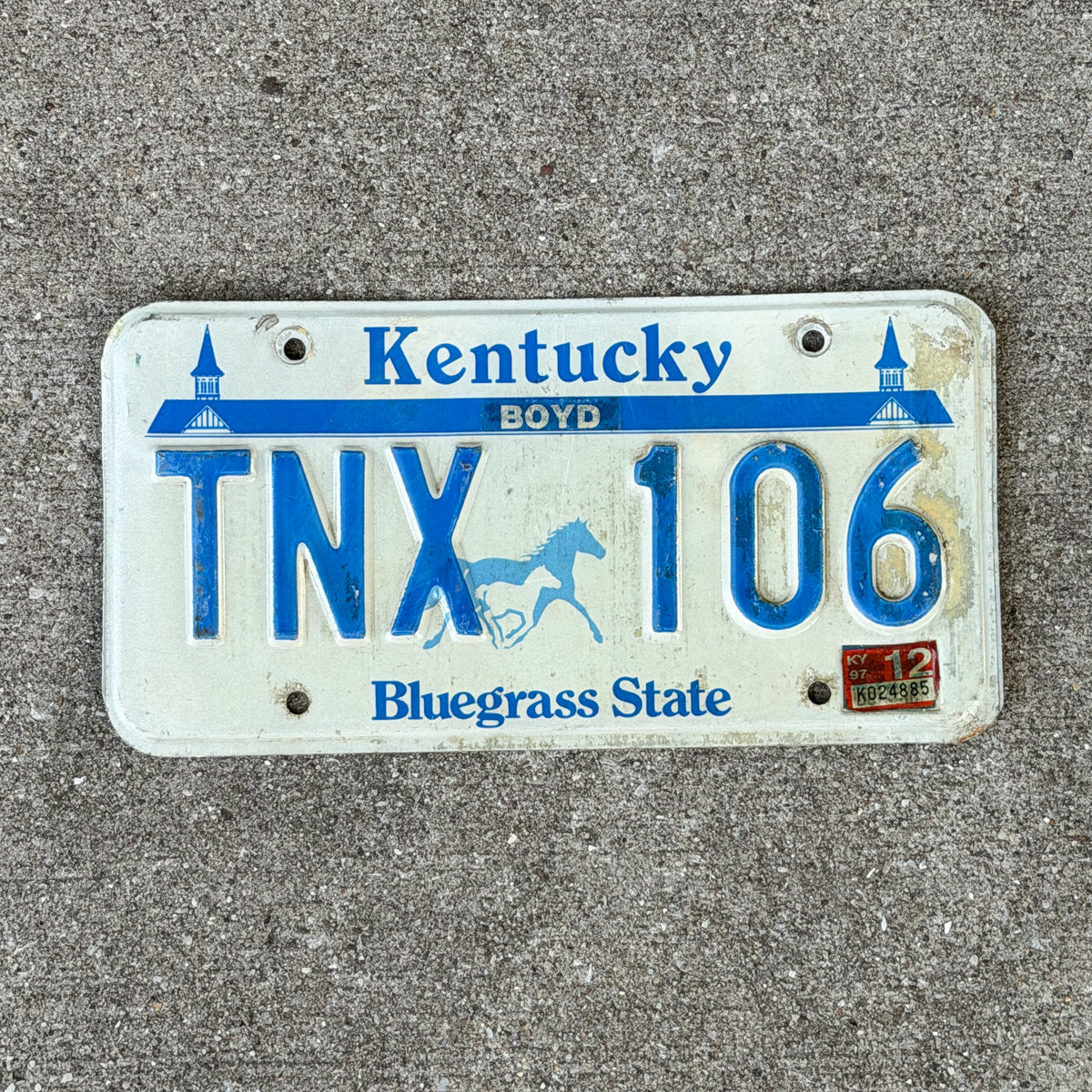Photo of a 1988 1997 Kentucky License Plate Auto Tag Garage Decor Vintage TNX 106 with original patina