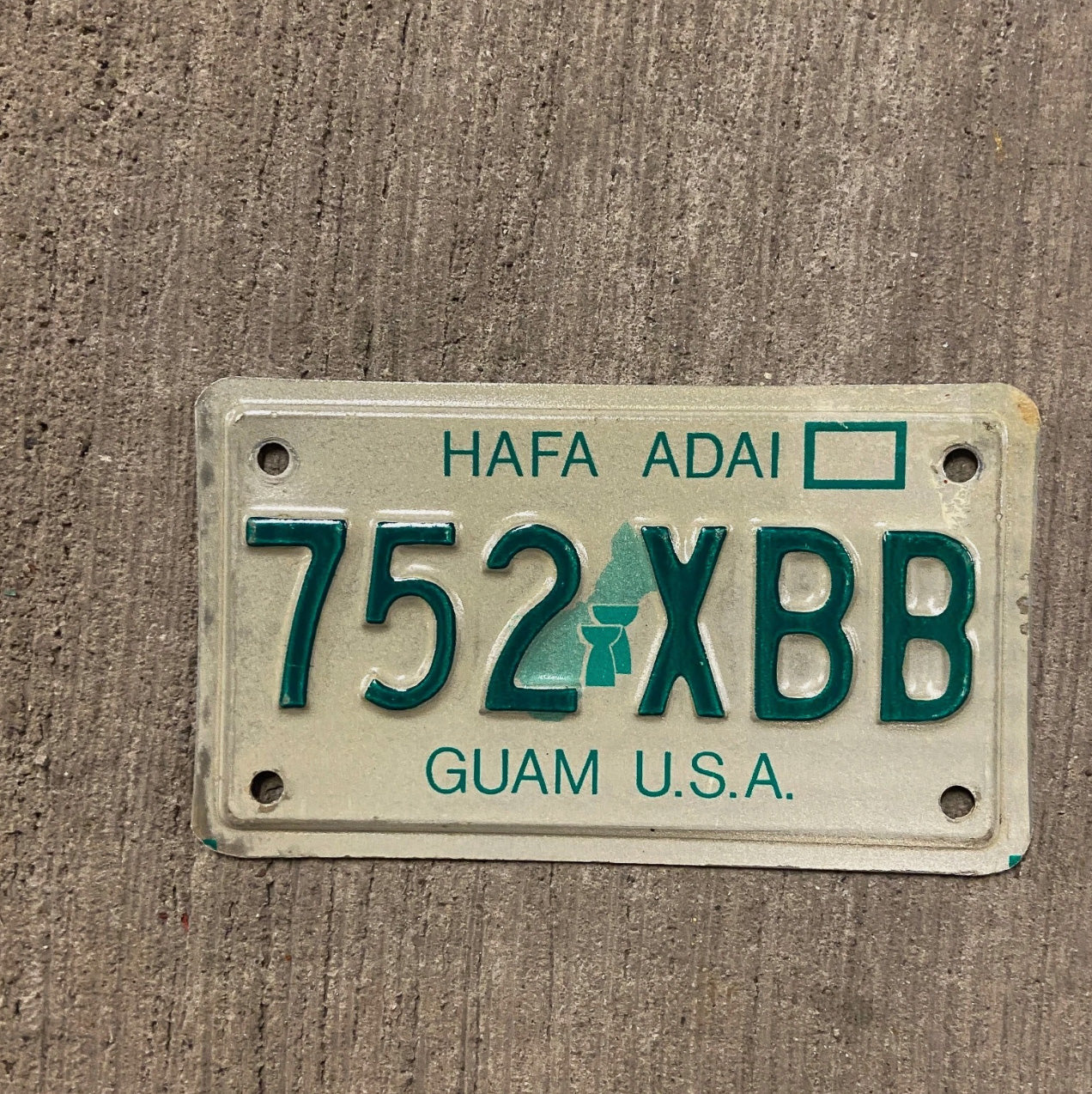 Photo of a 1988 Guam Motorcycle License Plate Auto Tag Garage Decor Vintage 752 XBB with original patina