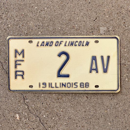Photo of a 1988 Illinois Manufacturer License Plate Auto Tag Garage Decor Vintage 2 AV with original patina