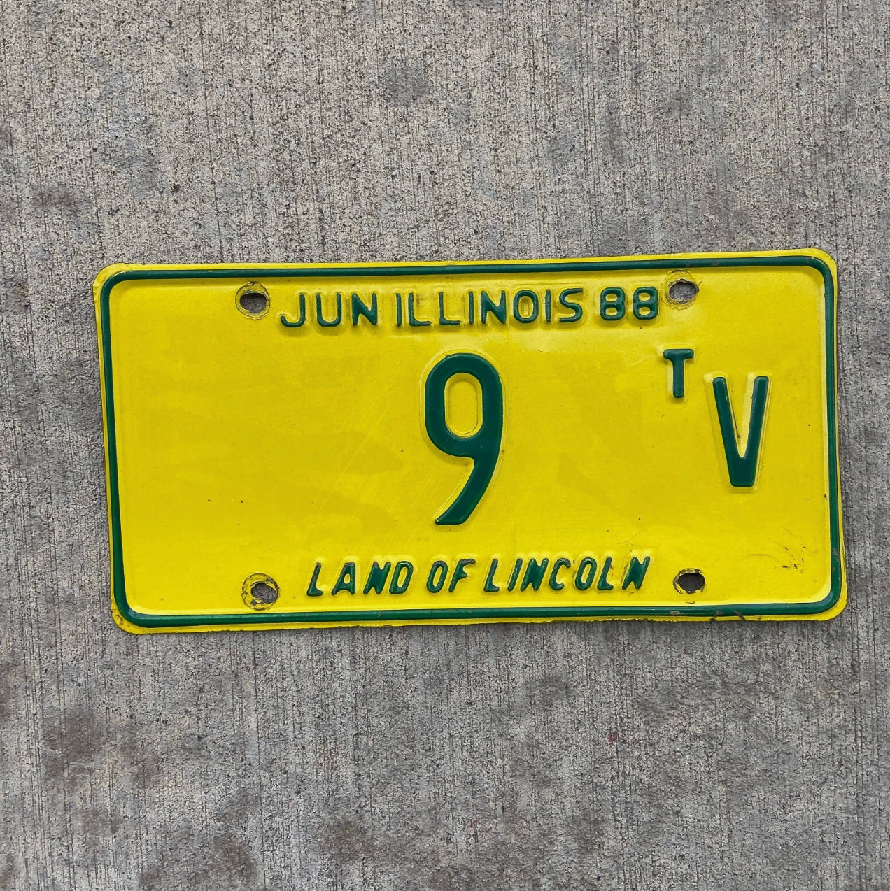 Photo of a 1988 Illinois Truck Tractor License Plate Auto Tag Garage Decor Vintage Low Number Single Digit 9 TV with original patina