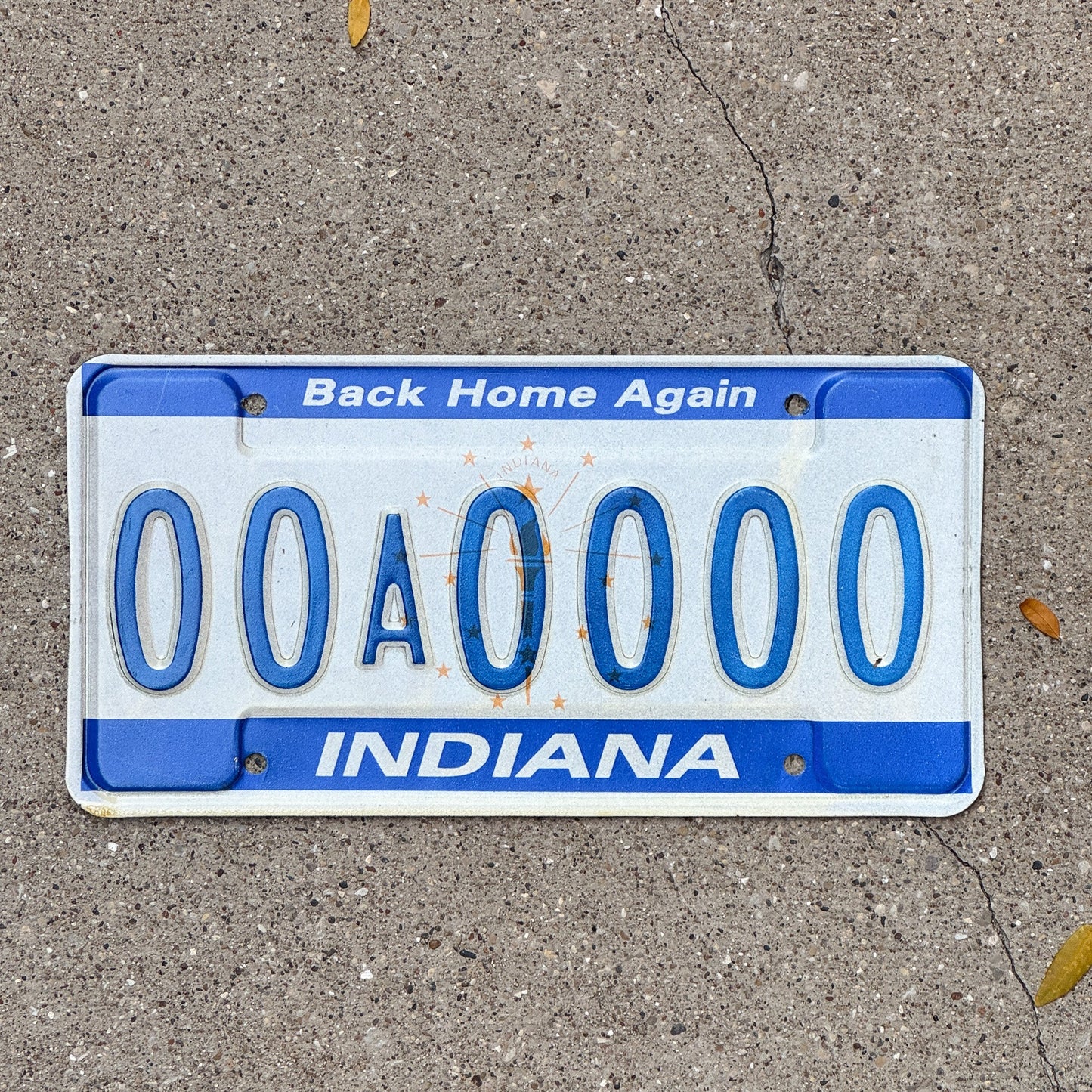 Photo of a 1988 Indiana Sample License Plate Auto Tag 3 Vintage 00A0000 with original patina