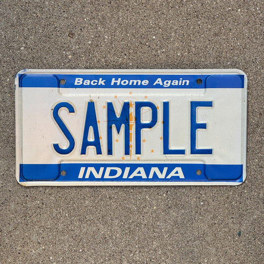 Photo of a 1988 Indiana Sample License Plate Auto Tag Garage Decor Vintage SAMPLE with original patina