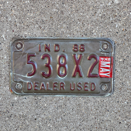 Photo of a 1988 Indiana Used Motorcycle Dealer License Plate Auto Tag Garage Decor Vintage 538 X 2 with original patina