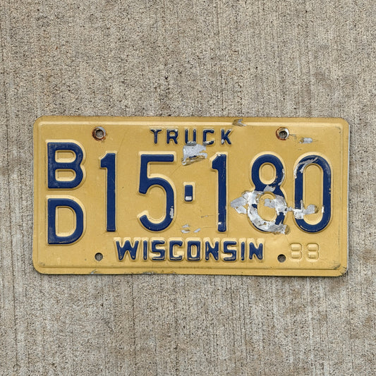 Photo of a 1988 Wisconsin Truck License Plate Auto Tag Garage Decor Vintage BD 15 180 with original patina