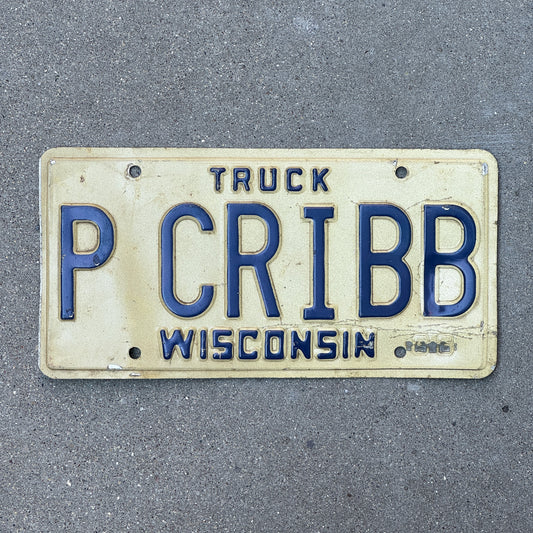 Photo of a 1988 Wisconsin Vanity Truck License Plate Auto Tag Garage Decor Vintage P CRIBB with original patina