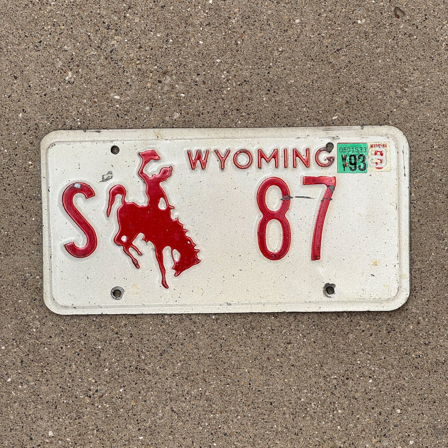 Photo of a 1988 Wyoming State Owned License Plate Auto Tag Garage Decor Vintage S 87