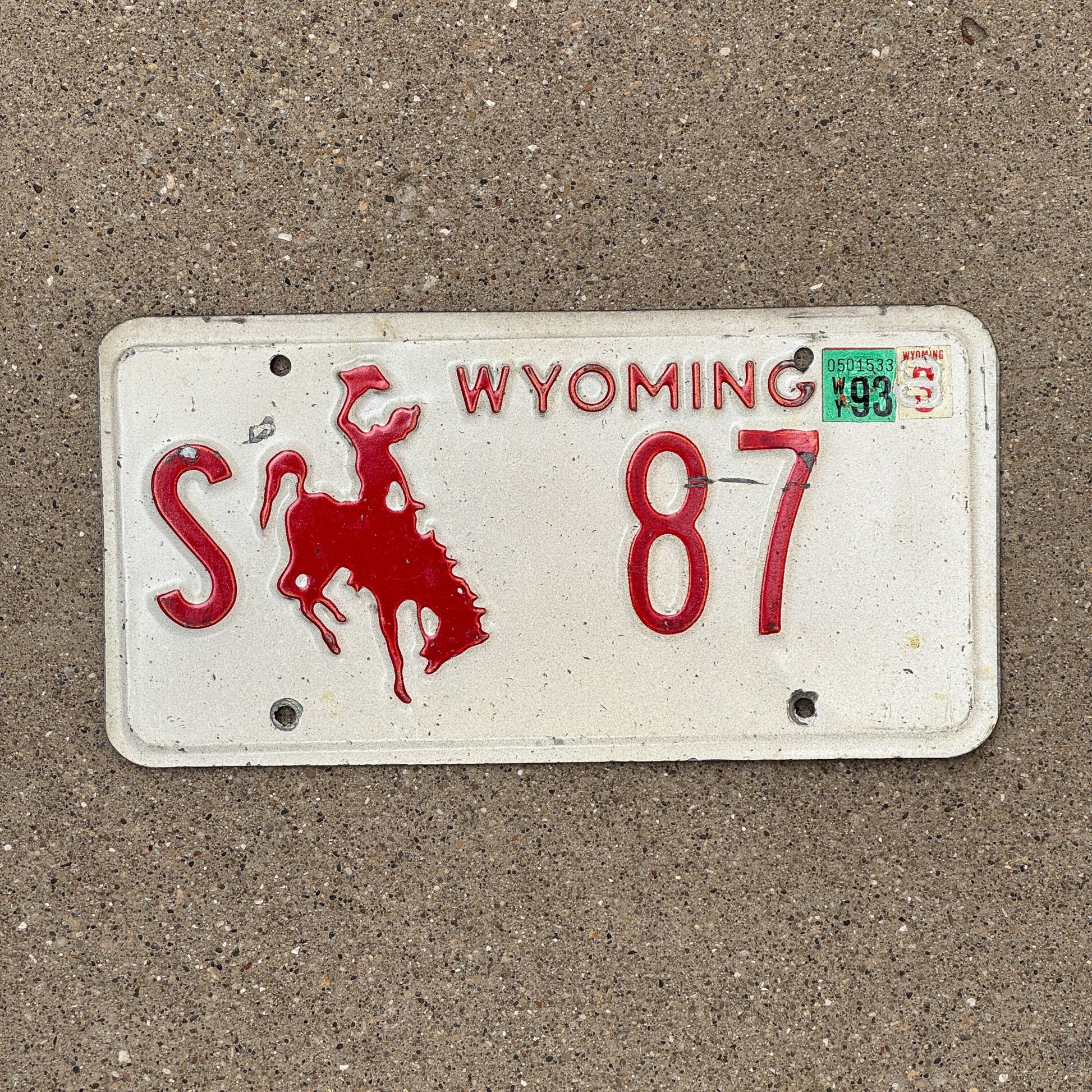 Photo of a 1988 Wyoming State Owned License Plate Auto Tag Garage Decor Vintage S 87