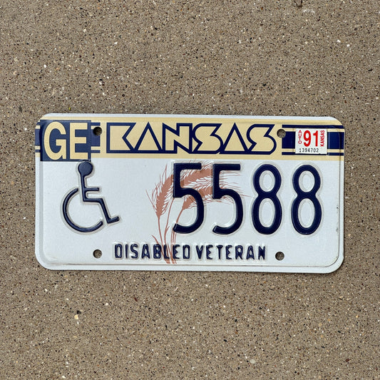 Photo of a 1989 1991 Kansas Disabled Veteran License Plate Auto Tag Garage Decor Vintage Military 5588