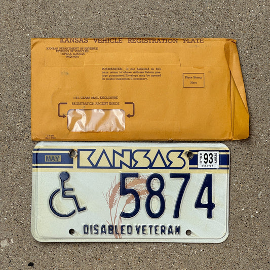 Photo of a 1989 1993 Kansas Disabled Veteran License Plate Auto Tag Garage Decor Vintage With Envelope 5874
