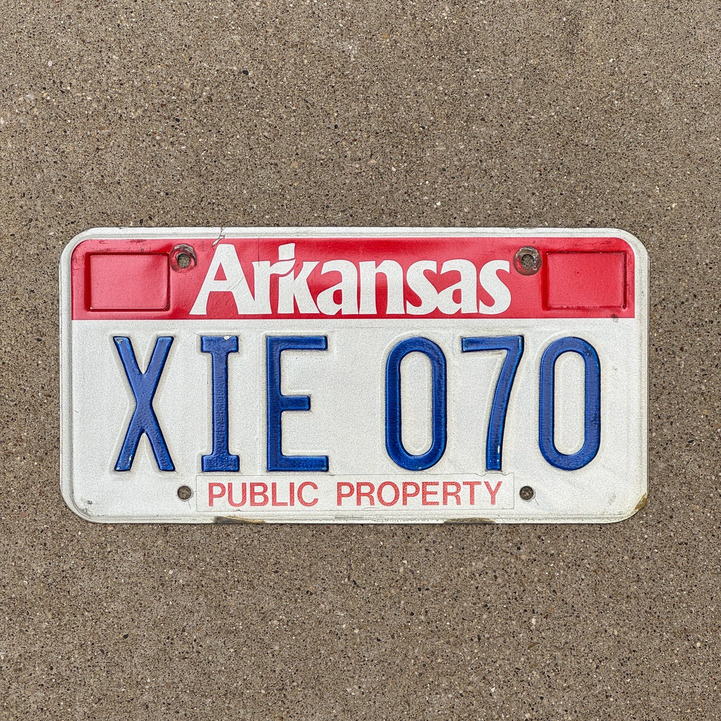 Photo of a 1989 Arkansas Public Property License Plate Auto Tag Garage Decor Vintage XIE 070