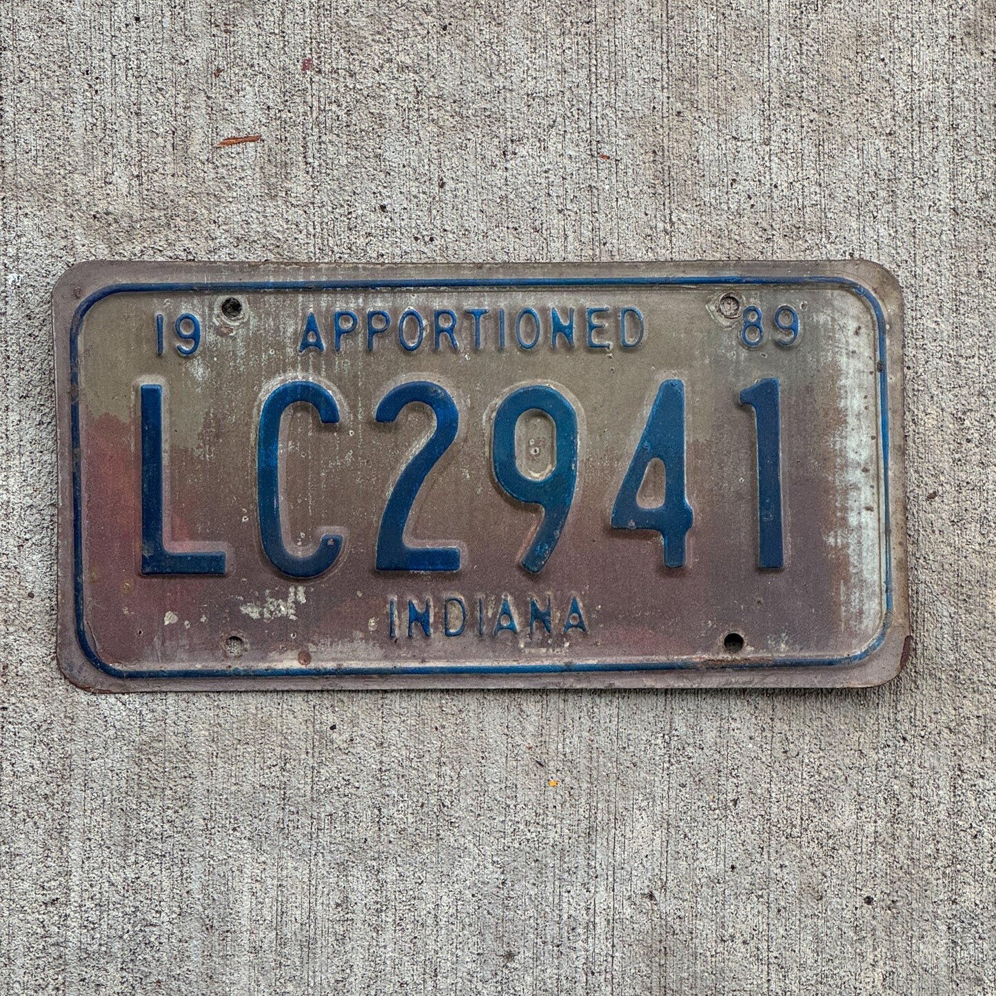 Photo of a 1989 Indiana Apportioned License Plate Auto Tag Garage Decor Vintage LC 2941 with original patina