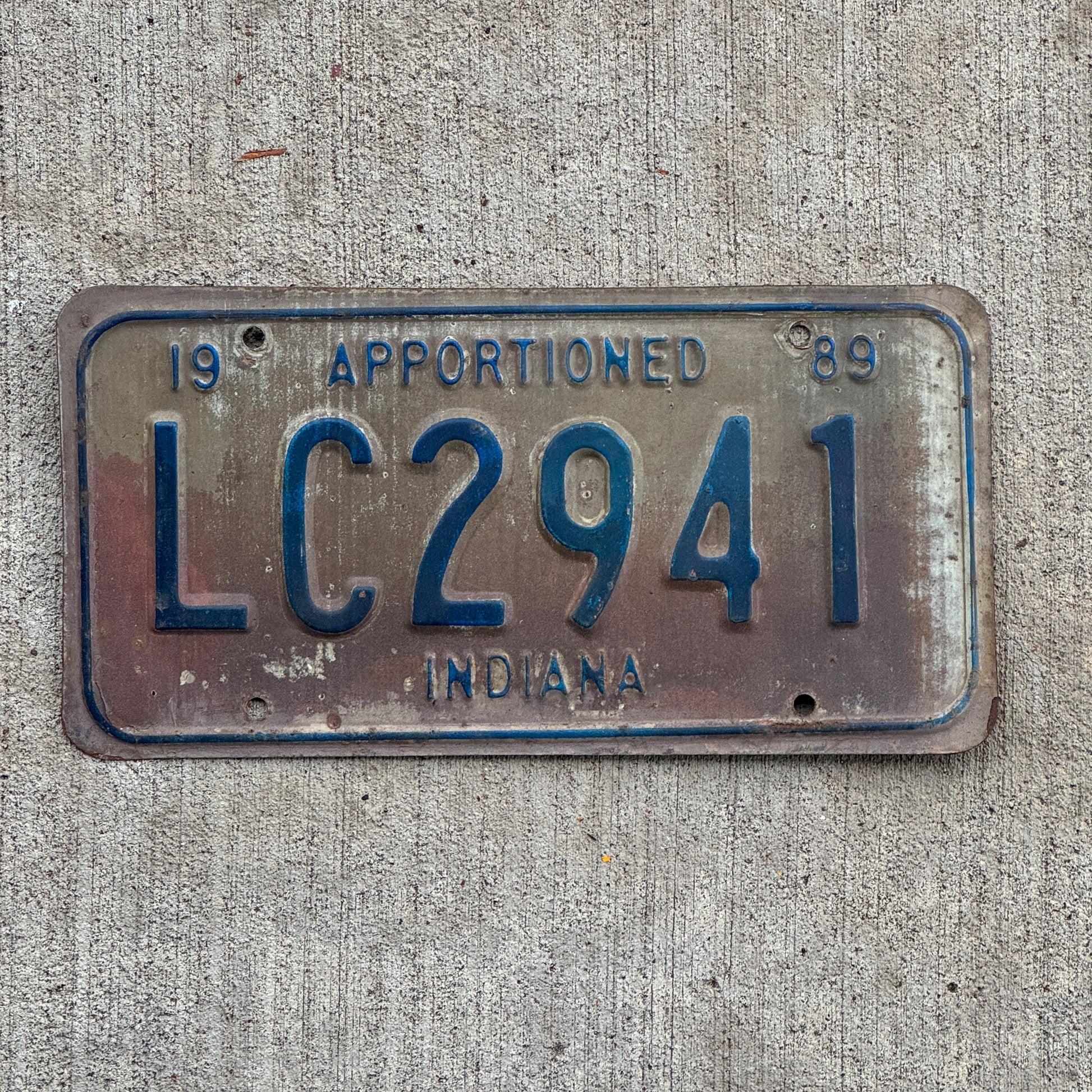 Photo of a 1989 Indiana Apportioned License Plate Auto Tag Garage Decor Vintage LC 2941 with original patina