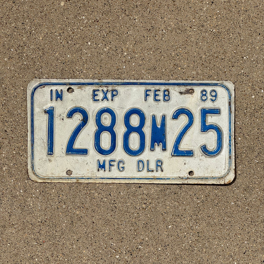 Photo of a 1989 Indiana Manufacture Dealer License Plate Auto Tag Garage Decor Vintage 1288 M 25
