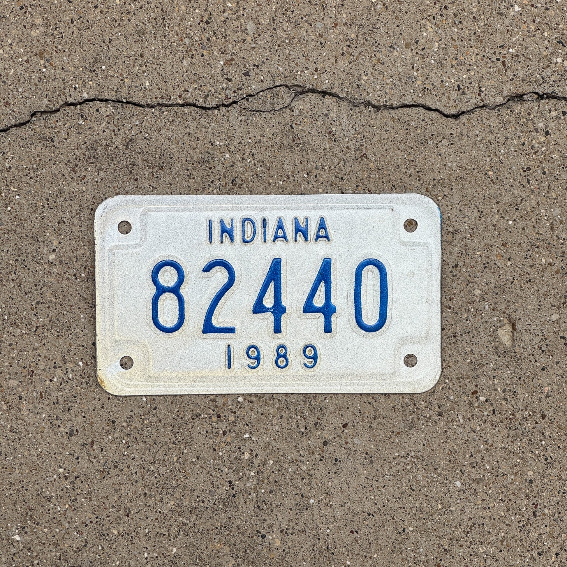 Photo of a 1989 Indiana Motorcycle License Plate Auto Tag Garage Decor Vintage 82440
