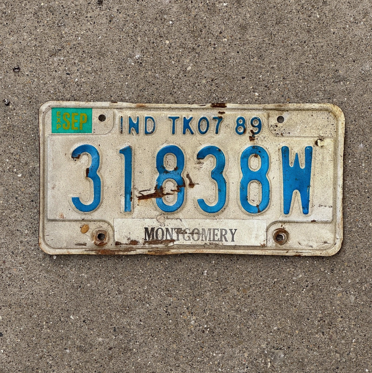 Photo of a 1989 Indiana Truck License Plate Auto Tag Garage Decor 31838 W