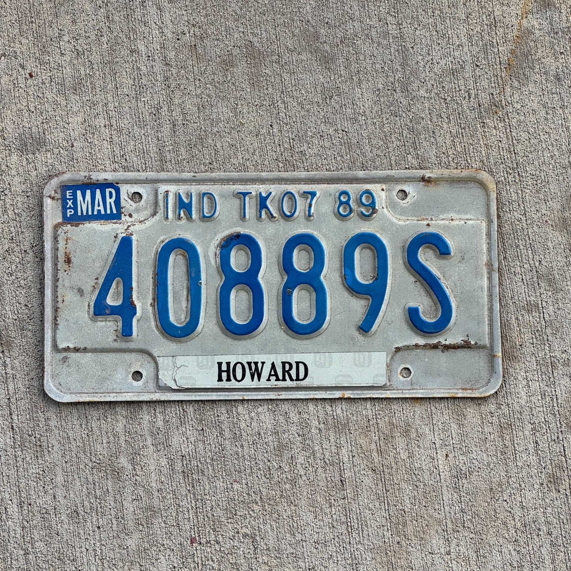 Photo of a 1989 Indiana Truck License Plate Auto Tag Garage Decor Vintage 40889 S with original patina