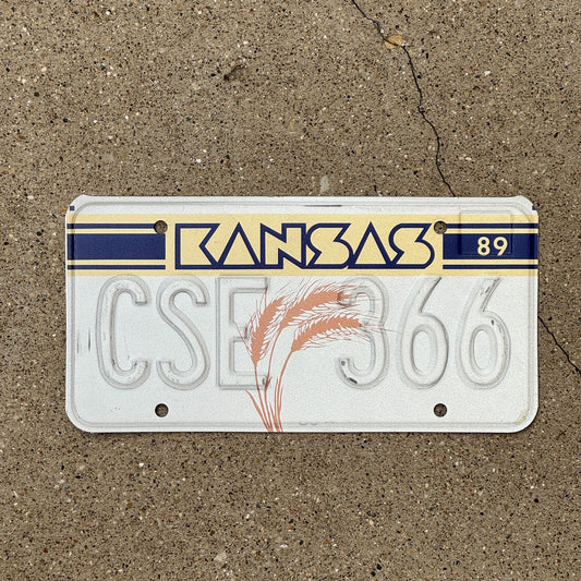 Photo of a 1989 Kansas Error License Plate Auto Tag Garage Decor Vintage Misprint CSE 366