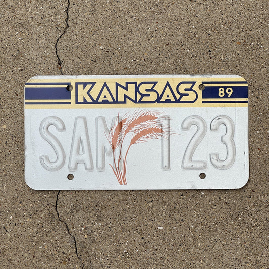 Photo of a 1989 Kansas Sample License Plate Auto Tag Garage Decor Vintage Error Misprint SAM 123