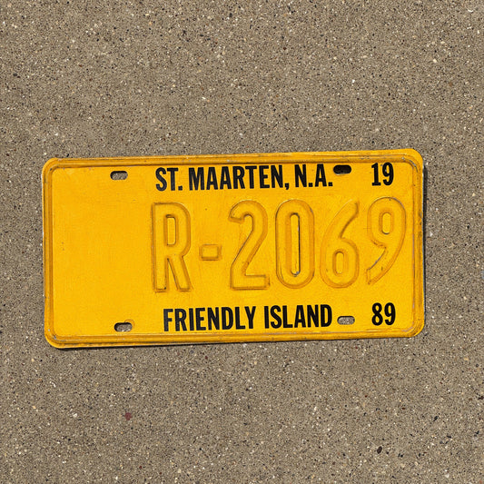 Photo of a 1989 St Maarten Rental Car License Plate Auto Tag Garage Decor Vintage Caribbean R 2069