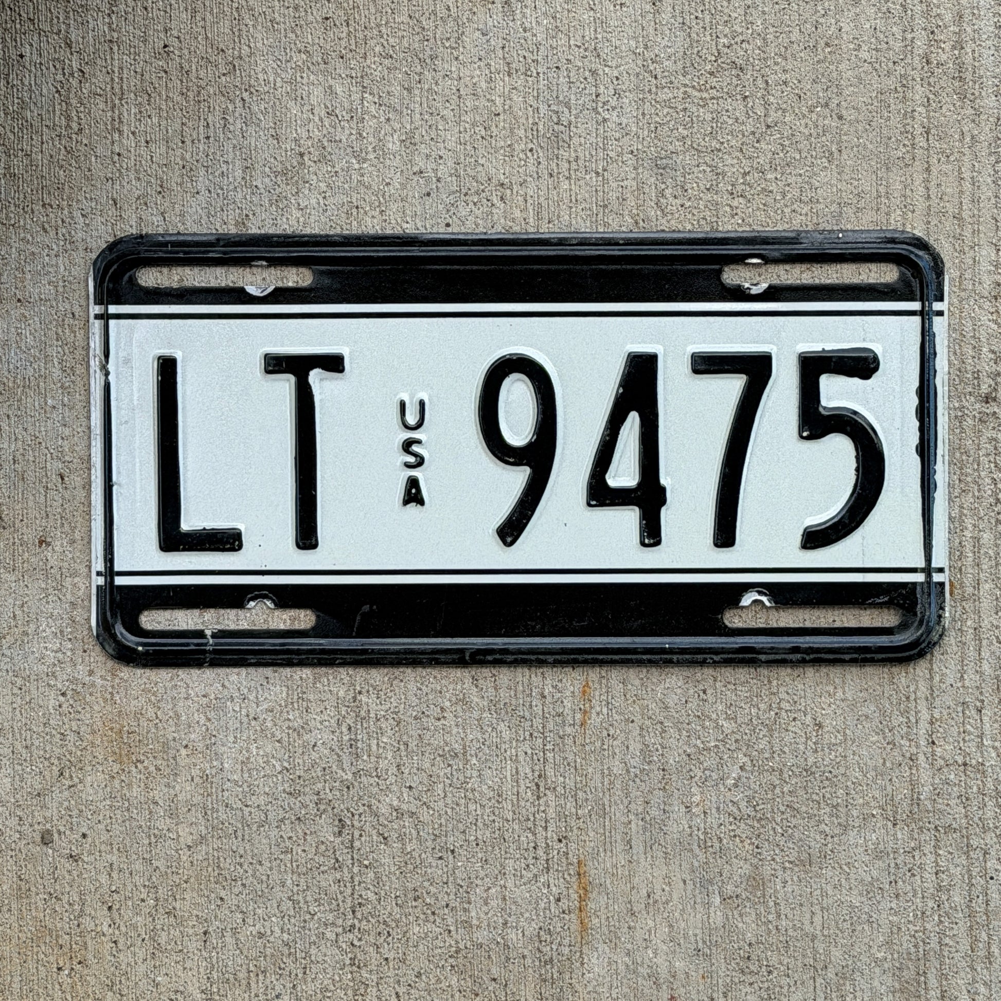 Photo of a 1989 US Forces Germany License Plate Auto Tag Garage Decor Vintage Military LT 9475 with original patina