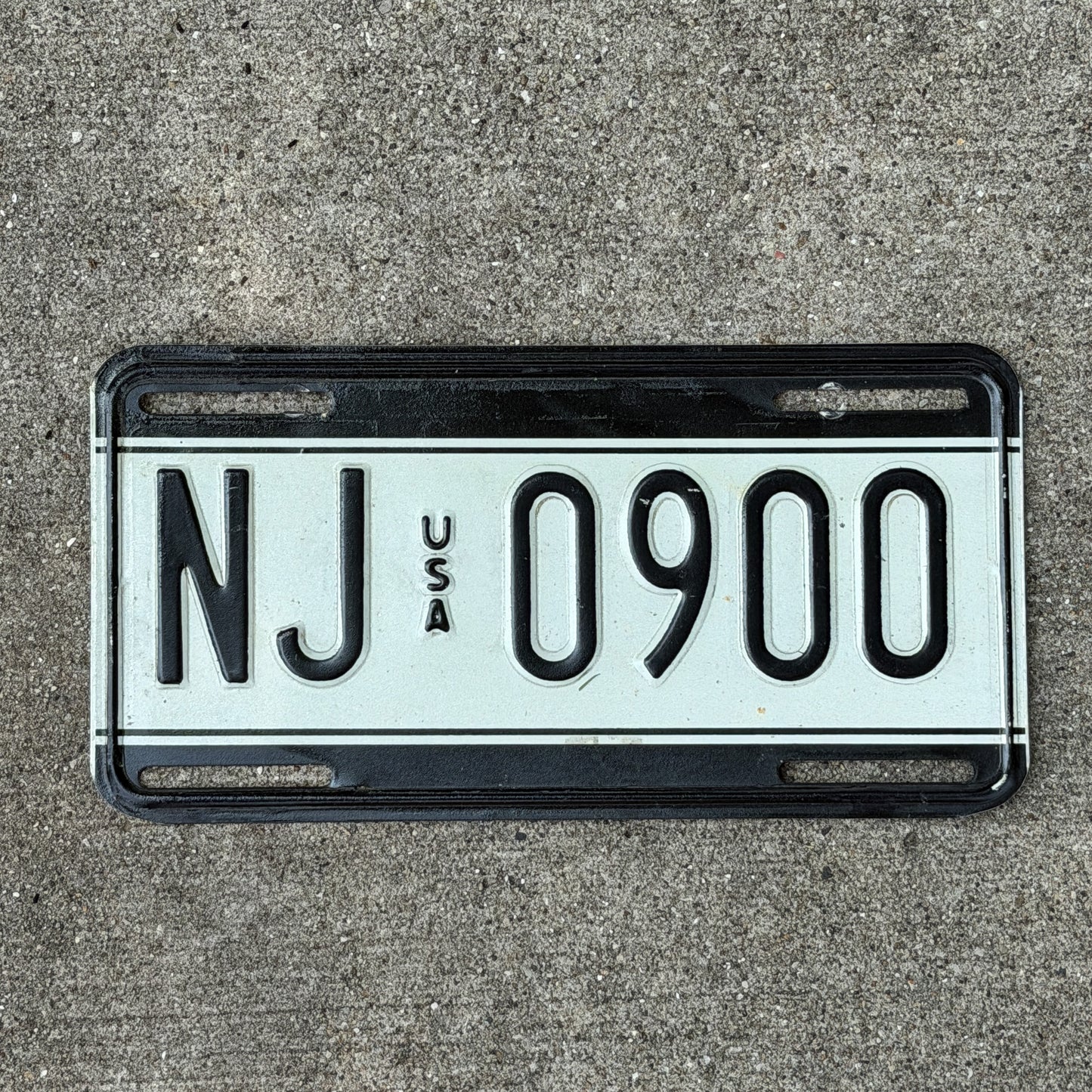 Photo of a 1989 US Forces Germany License Plate Auto Tag Garage Decor Vintage Military NJ 0900 with original patina