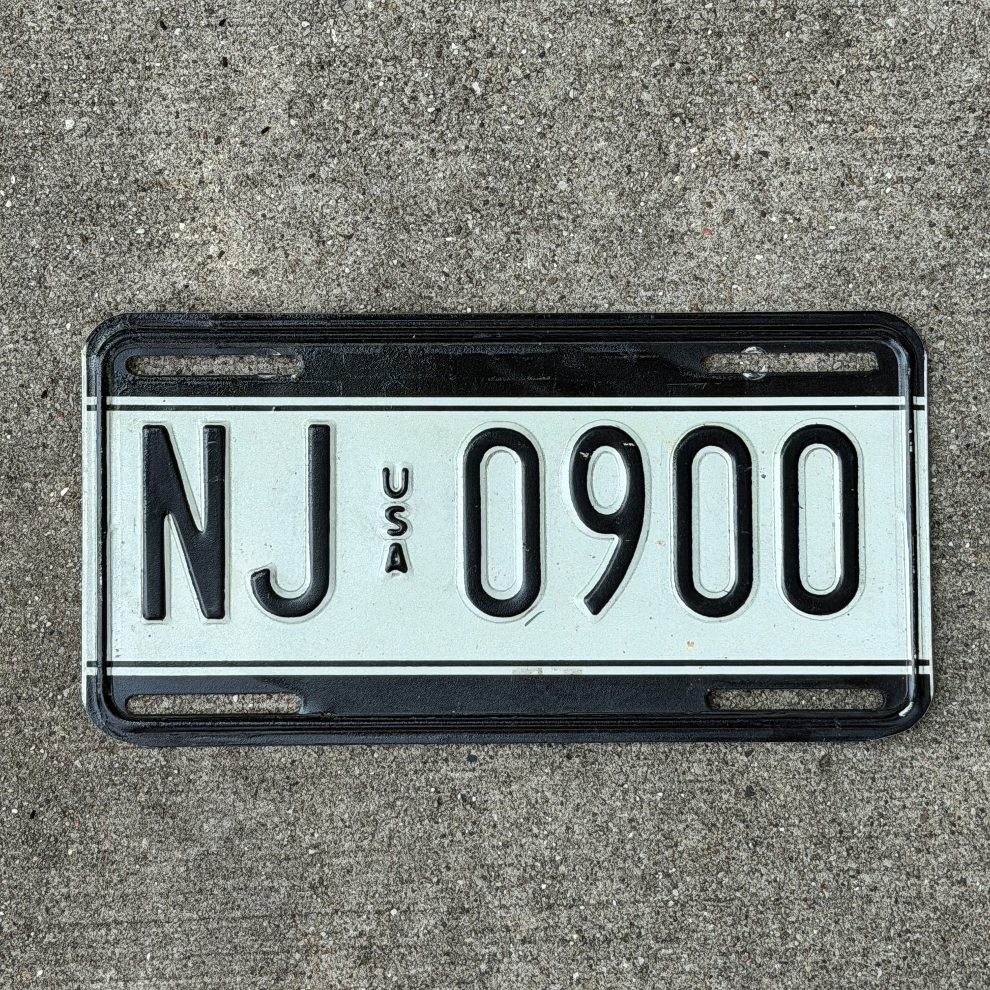 Photo of a 1989 US Forces Germany License Plate Auto Tag Garage Decor Vintage Military NJ 0900 with original patina