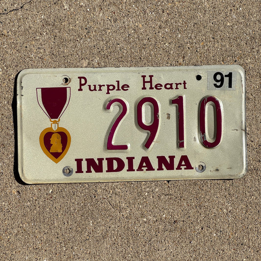 Photo of a 1990 1991 Indiana MILITARY License Plate Auto Tag Garage Decor Vintage Purple Heart 2910
