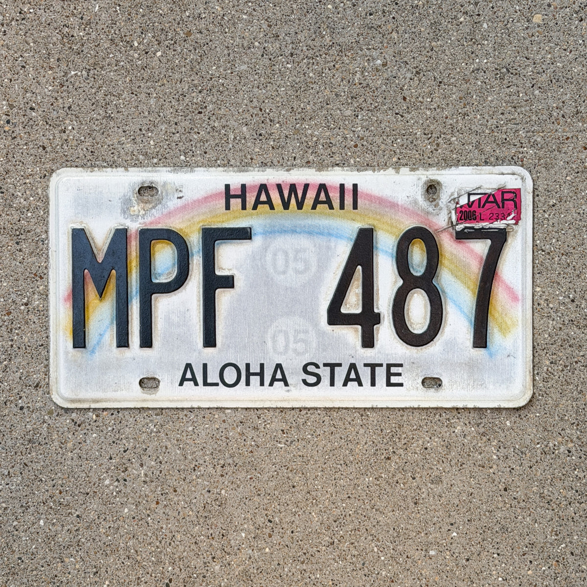Photo of a 1990 2006 Hawaii License Plate Auto Tag Garage Decor Vintage Rainbow MPF 487 with original patina