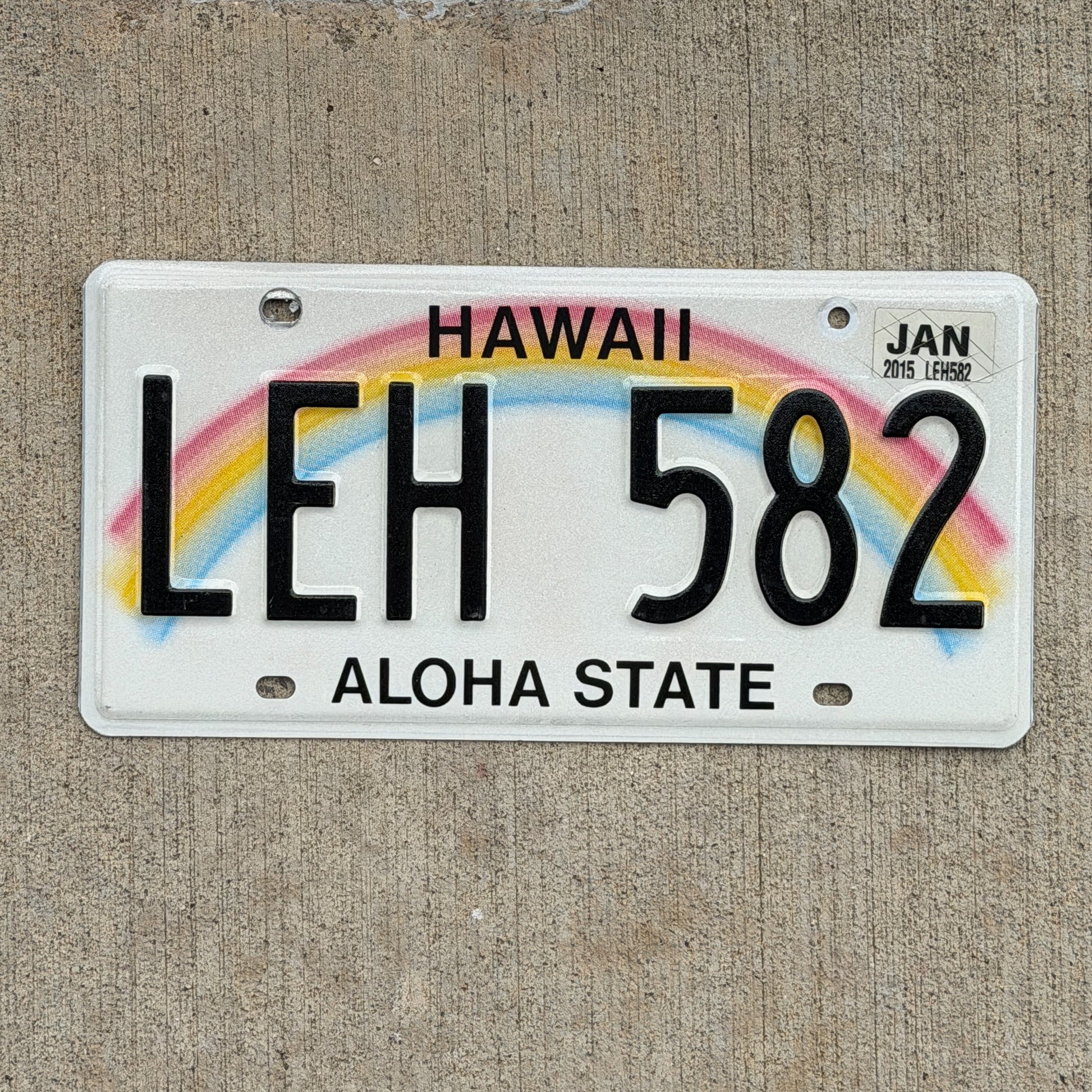 Photo of a 1990 2015 Hawaii License Plate Auto Tag Garage Decor Vintage LEH 582 with original patina