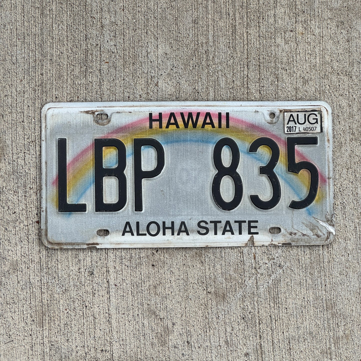 Photo of a 1990 2017 Hawaii License Plate Auto Tag Garage Decor Vintage Rainbow LBP 835 with original patina