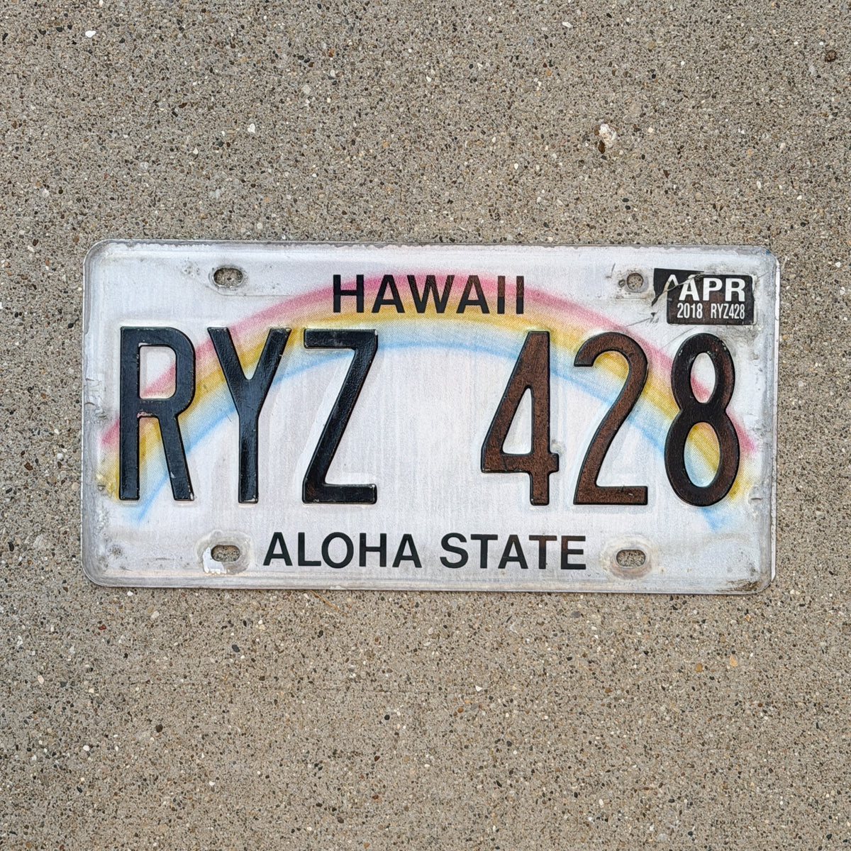 Photo of a 1990 2018 Hawaii License Plate Auto Tag Garage Decor Vintage Rainbow RYZ 428 with original patina