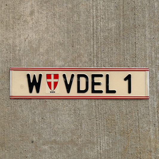 Photo of a 1990 Austria Vanity License Plate Auto Tag Garage Decor Vintage Wien W VDEL 1 with original patina