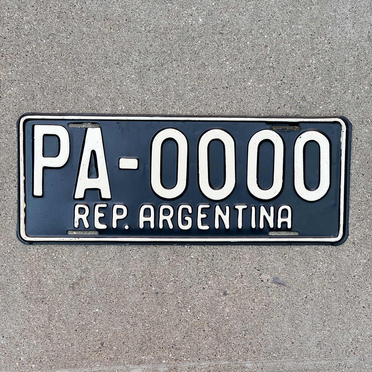 Photo of a 1990 Era Argentina Embassy Staff Sample License Plate Auto Tag Garage Decor Vintage PA 0000 with original patina