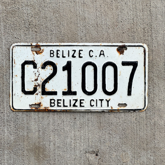 Photo of a 1990 Era Belize License Plate Auto Tag Garage Decor Vintage C 21007 with original patina