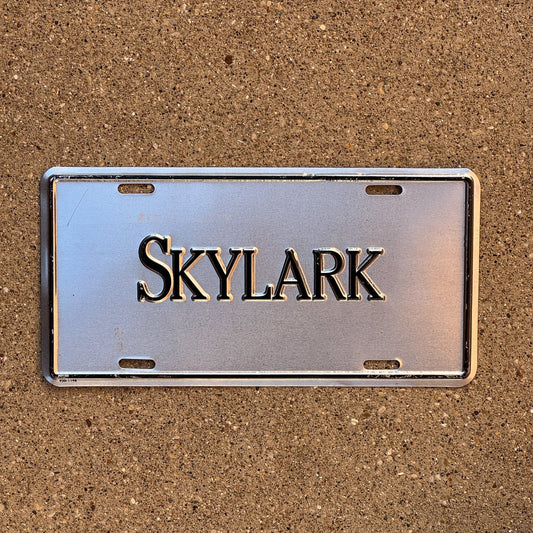 Photo of a 1990 Era Booster License Plate Auto Tag 1 Garage Decor Aluminum SKYLARK
