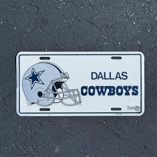 Photo of a 1990 Era Dallas Cowboys Texas Booster License Plate Auto Tag Garage Decor Vintage
 NFL Sports Football Metal with original patina