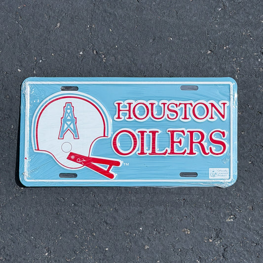 Photo of a 1990 Era Houston Oilers Texas Booster License Plate Auto Tag Garage Decor Vintage
 NFL Sports Football NOS Metal with original patina