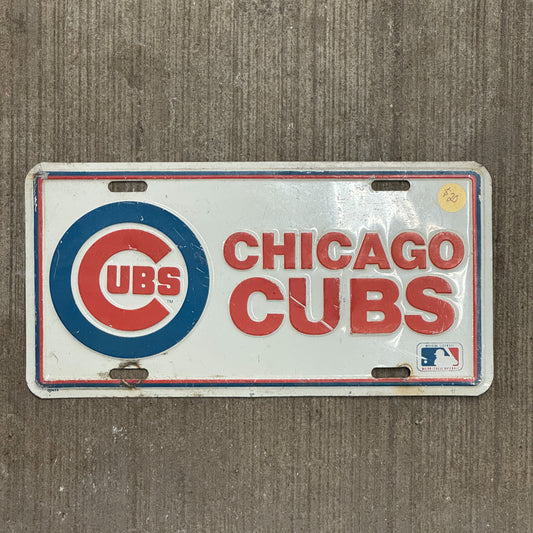 Photo of a 1990 Era Illinois Booster License Plate Auto Tag 2 Vintage Garage Metal MLB Baseball Chicago Cubs with original patina